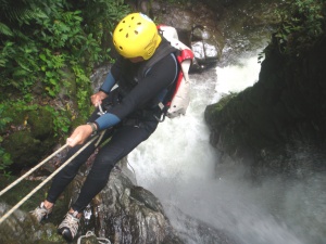 Canyoning near Merida, Venezuela; further into the 27-meter waterfall