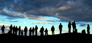 Adventure travelers hike across
a ridge in Nunavut, Canada