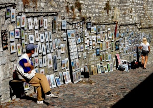 Distracted picture vendor in
Old Town of Tallinn, Estonia