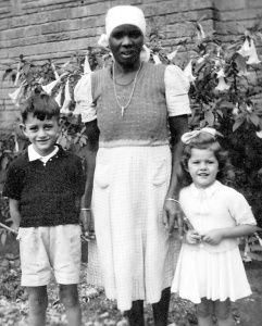 1945. Tom, sister Vera and nanny
Aya, at home in Nairobi, Kenya